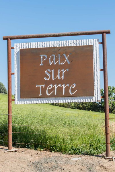 Paix Sur Terre sign on the main road